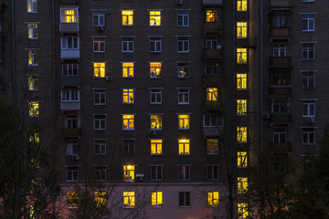 Illuminated windows of dwelling house