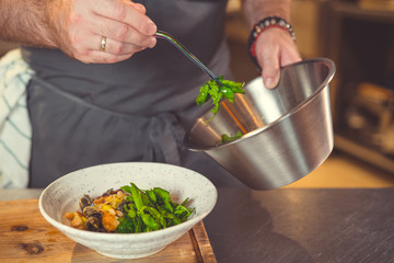 Chef cooking dish