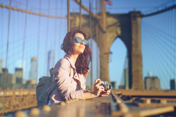 Woman on a bridge - obrazy, fototapety, plakaty