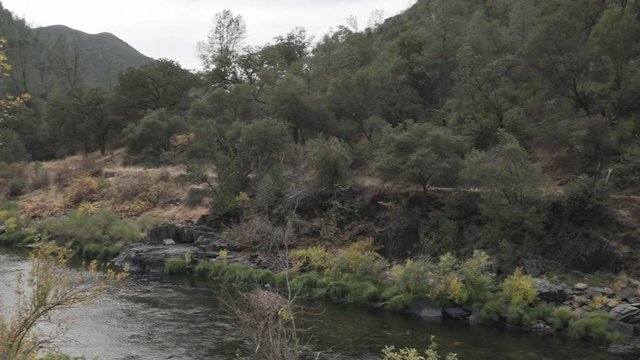 gimbal pan shot of merced river landscape