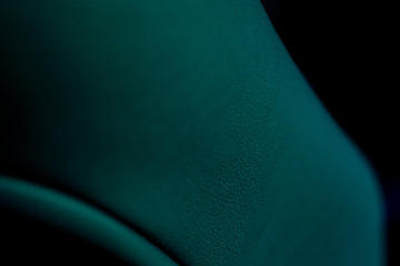 Close up to Car seat detail. Dark leather in cabin