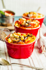 Portioned casserole.from corn grits, eggplant and tomato sauce. Vegetarian gluten free dinner.