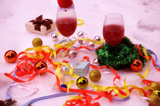 red wine , fir branch with Christmas toys and candy