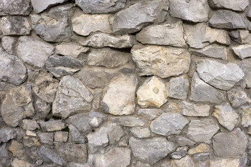 Typical Georgian wall stacked from mountain rocks. Georgia
