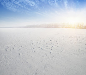  Snowcovered fields on blue sky