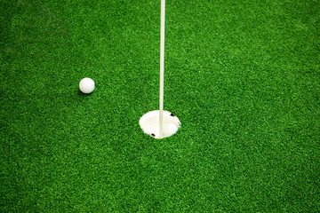 Golf balls on the green field
