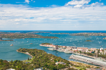 Fototapeta premium Aerial view of picturesque Sydney Harbour on sunny day