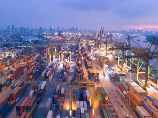 Obraz premium container,container ship in import export and business logistic,By crane,Trade Port , Shipping,cargo to harbor.Aerial view,Water transport,International,Shell Marine,transportation,logistic,trade,port