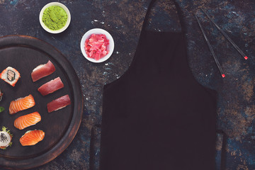 Blank black apron in a sushi restaurant