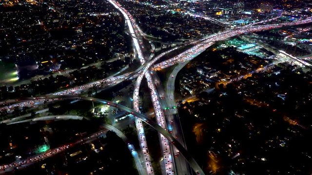 Aerial view of the 405 and 110 highway intersection in Downtown Los Angeles in 4K from a helicopter