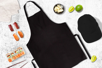 Empty black apron in a sushi bar