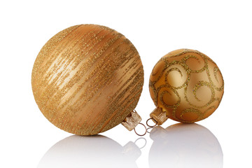 .Close-up of beautiful gold christmas balls with golden glittering pattern