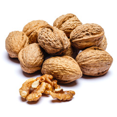 pile of walnuts isolated on white background