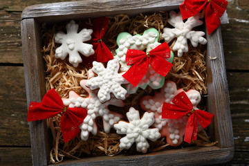 snowflakes cookies and red xmas decorations