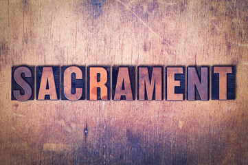 Sacrament Theme Letterpress Word on Wood Background