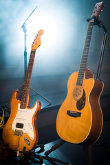 guitars stage composition in a vintage concert hall on light background