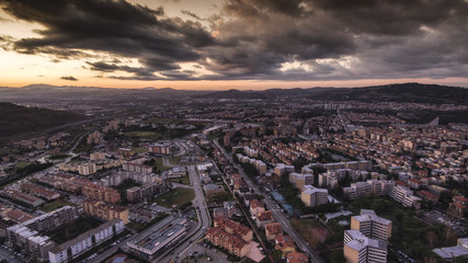 Obraz premium ITALY, Pesaro December 2017 - aerial view of the city with stormy houses, streets, hills and storm clouds