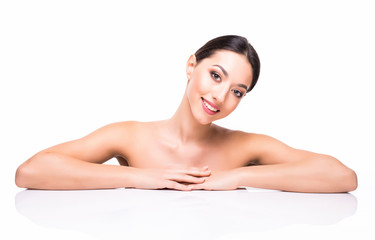 Obraz premium Beautiful Young Woman with Clean Fresh Skin touch own face . Facial treatment . Cosmetology , beauty and spa .