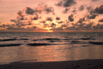 Naklejka na ściany i meble Sunrise on the beach in Punta Cana, Dominican Republic.