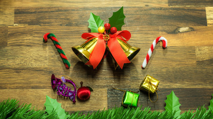 Christmas and new year decoration items with small elements. flat lay decorationon the wooden background. Top view.