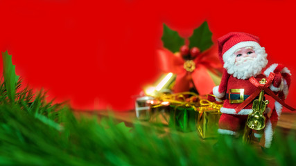 Christmas decoration items with small elements. flat lay decorationon the wooden background. Top view. Attributes of the New Year.