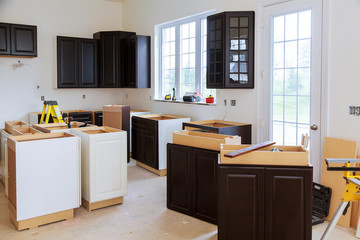 Installing new induction hob in modern kitchen kitchen