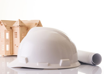 Helmet or hard hat, rolled construction blueprints