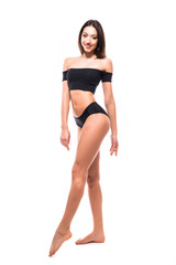 Fototapeta premium Beautiful Woman with perfect sport body in black underwear isolated on white backgroun. Perfect Body. Full length portrait