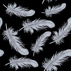 Obraz premium Vector seamless pattern with bird feathers.