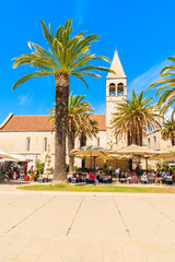 TROGIR TOWN, CROATIA - SEP 6, 2017: historical buildings and church in old town of Trogir on sunny summer day, Dalmatia, Croatia.