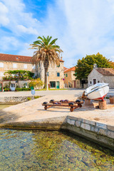 Naklejka premium Fishing boat in Postira village with beautiful port, Brac island, Croatia