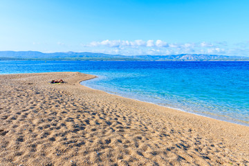View of famous Zlatni Rat beach with beautiful sea water in Bol town, Brac island, Croatia