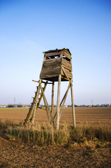 Hunter lookout tower in the middle of field