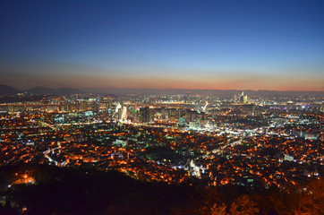 Fototapeta na wymiar Seoul night cityscape at N Seoul Tower. Panorama from the top of the city, South Korea