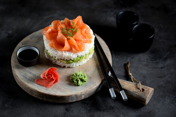 Sushi cake with lightly salted salmon, nori and avocado.