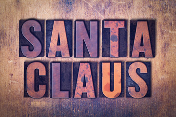 Santa Claus Theme Letterpress Word on Wood Background