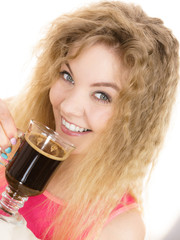 Positive woman drinking her morning coffee