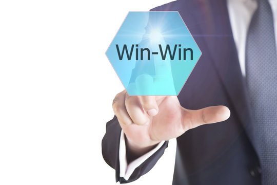 Businessman presses win-win collocation in cloud of hexagon. businessman touched win icon. Win win sign business concept, life, think, strategy, success, web, 