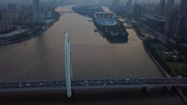 sunset sky guangzhou city pearl river liede bridge haixinsha island aerial panorama 4k china
