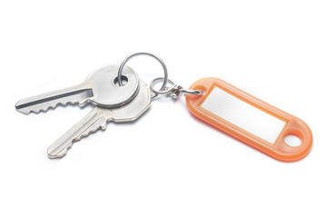 Key with plastic tag isolated