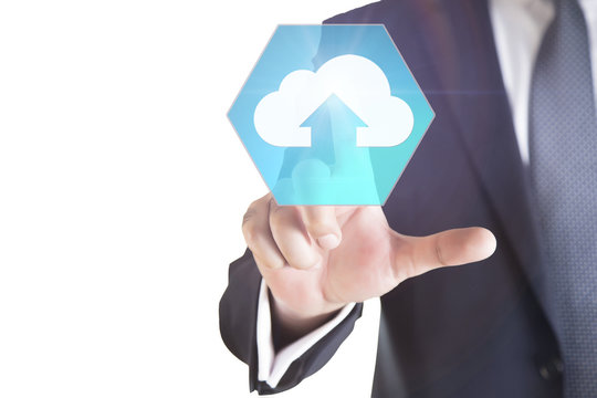 Businessman pressing cloud computing icon with virtual screen. Cloud storage concept.