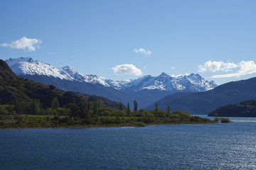 Naklejka na ściany i meble Landscape along the Carretera Austral next to the azure blue waters of Lago Bertrand in Patagonia, Chile