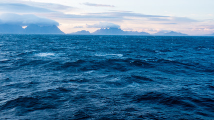 Fototapeta premium Lofoten, Norway. The beautiful dramatic sea view and cloudy sky in Lofoten.