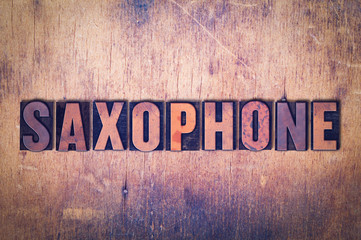 Saxophone Theme Letterpress Word on Wood Background