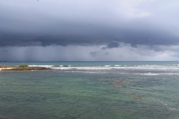 Praia e tempestade