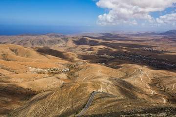 aerial view of road with hills