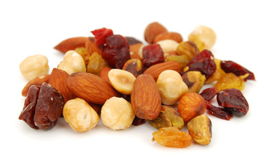 Mix nuts, dry fruits and grapes on a white background