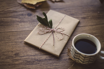 Wrapped gifts on a table and coffee