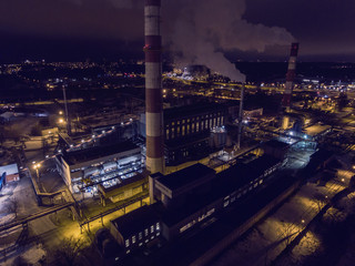 Fototapeta na wymiar Aerial view of central heating station Vilnius city power plant, Lithuania. During winter season night time.