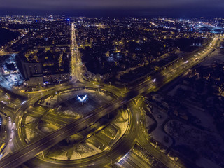 Aerial view over busy Vilnius the capital city of Lithuania, during winter season night time.